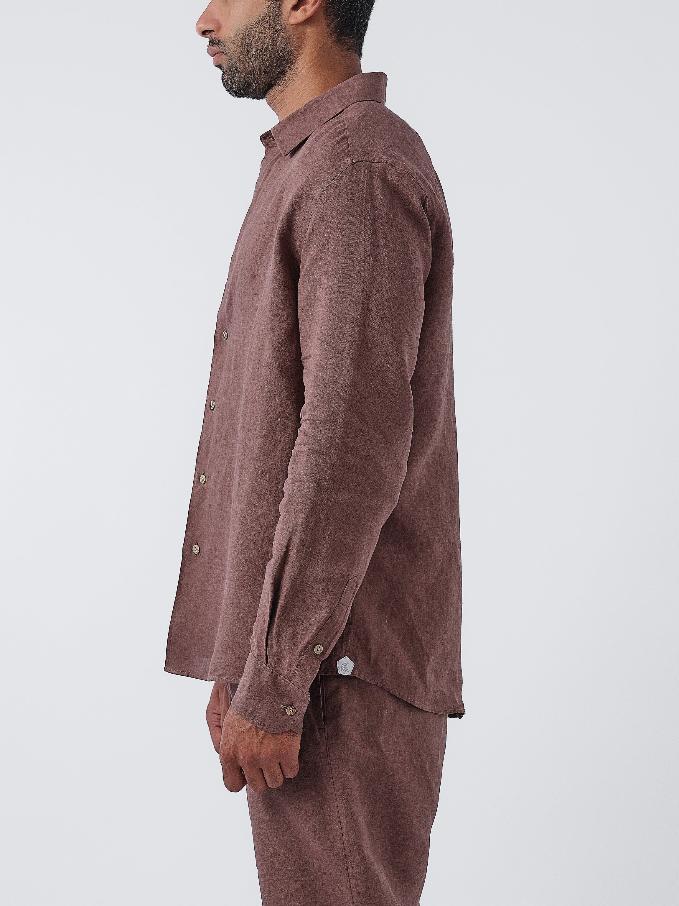 Man wearing an Espresso shirt and pants on a white background